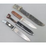 A German Whitby knife marked Whitby Made in Solingen with 13cm blade and complete with leather