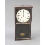 Seth Thomas, an American 8 day wall clock with 28.5cm dial, contained in a stained pine case 78cm