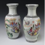 A pair of Chinese Republic oviform vases decorated with figures in boats with script 36cm Both