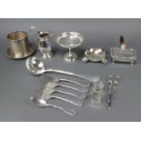 A silver plated ladle and minor plated wares