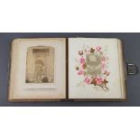 A Victorian leather bound photograph album containing a collection of black and white portrait