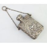 A Victorian repousse silver rounded rectangular scent bottle and stopper Birmingham 1887, 29