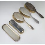A pair of silver engine turned hair brushes Birmingham 1929, 1 other, clothes brush and a pin tray