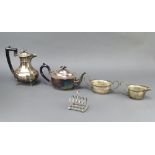 A silver plated 4 piece tea set and toast rack