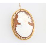 A 9ct yellow gold mounted cameo brooch, portrait of a lady 45mm x 35mm