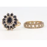 A 9ct yellow gold sapphire cluster ring 3.8 grams, size M and a 9ct eternity ring size M, 3.1 grams
