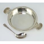 A silver quaich with cast classical handles Birmingham 1999, 22cm, together with a spoon boxed,