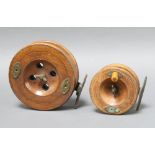 A wooden and brass star back centre pin fishing reel 4" (1 handle missing) together with 1 other