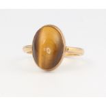 A 9ct yellow gold tigers eye ring 3.5 grams, size M