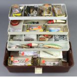 A large collection of 1970's vintage fishing lures including 10 unused and boxed Shakespeare