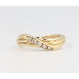 A 9ct yellow gold crossover ring, 2.3 grams size N 1/2