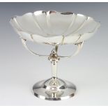 An Arts & Crafts Edwardian silver tazza with swept supports Sheffield 1906, 14cm, 338 grams