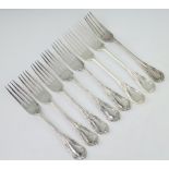 A Victorian silver lily pattern table fork London 1868, 7 others, mixed dates, 728 grams
