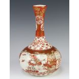 A late 19th Century Kutani oviform vase decorated with panels of flowers 24cm There is some wear