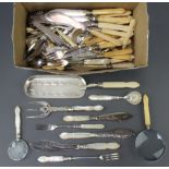 A quantity of lily pattern silver plated cutlery with mother of pearl and ivory handles