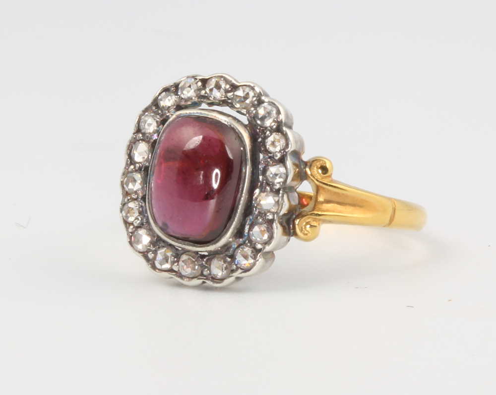 A15ct yellow gold cabochon garnet and diamond ring in the Victorian style 2.8 grams, size O