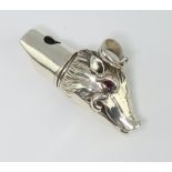 A Continental silver boars head whistle, 19 grams