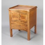 A Georgian mahogany concave commode with 3/4 gallery, the upper section fitted a cupboard enclosed