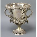An Edwardian silver plated 2 handled champagne cooler with vinous decoration and rustic handles 28cm