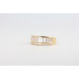 A 14ct yellow gold baguette set paste ring 3.9 grams