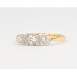 An 18ct yellow gold 3 stone diamond ring approx. 0.45ct, size M, 2.3 grams