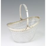 A Victorian silver mounted cut glass bowl with swing handle London 1869, 13cm