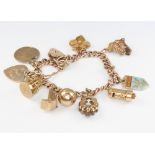 A 9ct yellow gold charm bracelet 33 grams