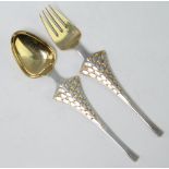 A Michelsen, a sterling silver gilt and enamelled 1965 spoon and fork, 92 grams