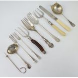 A Victorian silver sifter spoon Sheffield 1889 and minor silver cutlery, weighable silver 260 grams
