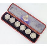A set of 6 Edwardian silver buttons decorated with portrait of a female warrior London 1902 in a