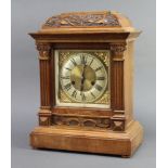 Hamburg American Clock Co. a Victorian 8 day striking bracket clock with gilt dial and silvered