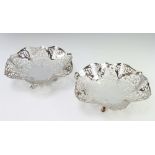 A pair of silver dishes with pierced decoration raised on pad feet, Sheffield 1966, 19cm, 422 grams