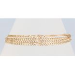 A 9ct yellow gold multi chain bracelet 7.5 grams