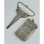 An Edwardian silver repousse aide memoire London 1902 together with an Edwardian silver scissor