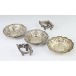 A pair of Victorian repousse silver pierced bon bon dishes, Chester 1897, a single ditto and 2