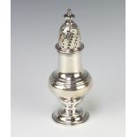 An Edwardian Queen Anne style silver sugar shaker of baluster form Birmingham 1904, 21cm, 230 grams