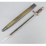 A 1917 Remington bayonet complete with scabbard