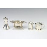 A silver tea strainer and stand Birmingham 1912, 3 condiments 178 grams