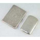 An Edwardian silver mounted purse together with a Continental silver ditto