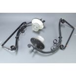 A pair of wrought iron external wall light brackets with glass shades 101cm h x 32cm w Some light