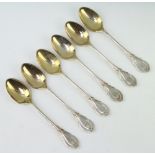 A set of 6 Edwardian silver lily pattern teaspoons with gilt bowls 150 grams