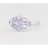 A 9ct white gold tanzanite ring size Q 1/2, 2 grams