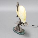 A bronze and glass table lamp in the form of a stork raised on an oval marble base, base marked 1996