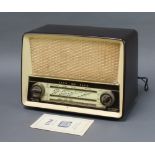 An EKCO Model U319 radio complete with instructions, original receipt and radio licence