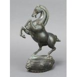 A Japanese bronze figure of a rearing horse raised on an oval base 24cm h x 11cm w x 7cm d This