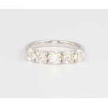 An 18ct white gold 5 stone diamond ring approx. 1.95ct, 3.4 grams, size N