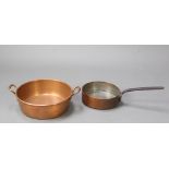 A circular copper saucepan with iron handle marked 26 8cm x 26cm together with a circular copper