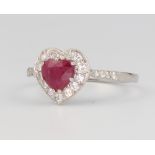 A platinum Edwardian style heart cut ruby and diamond cluster ring, the centre stone approx. 1.