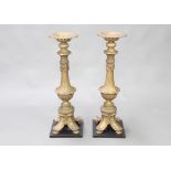 A pair of large and impressive Rococo style gilt metal pricket candlesticks raised on square