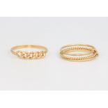 Two 18ct yellow gold rings, sizes K and M, 3 grams